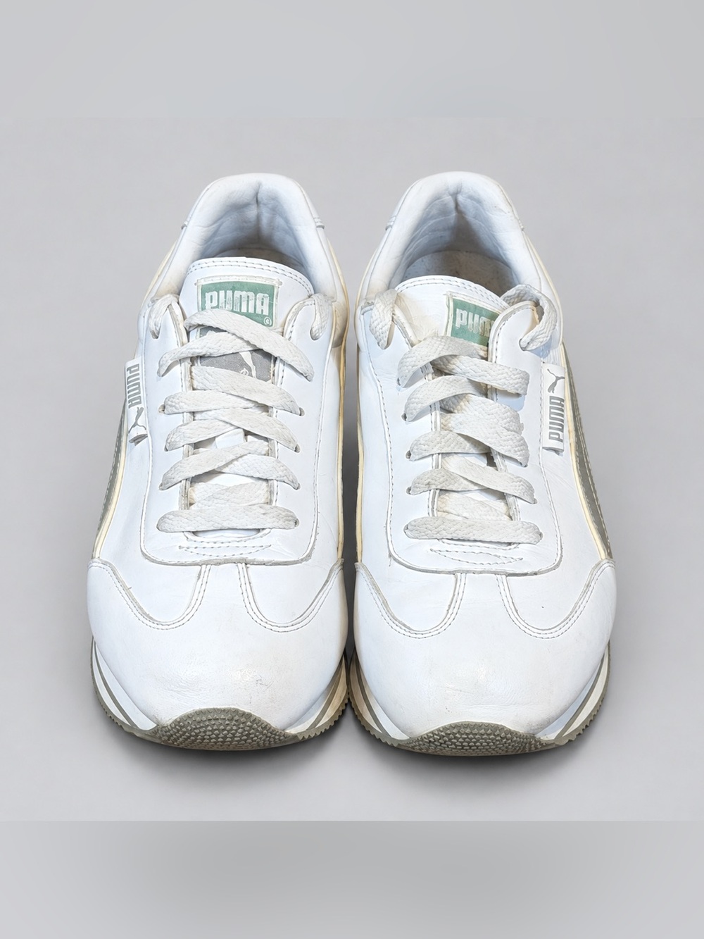 Puma Men’s White Sneakers with Gold Accent Stripes